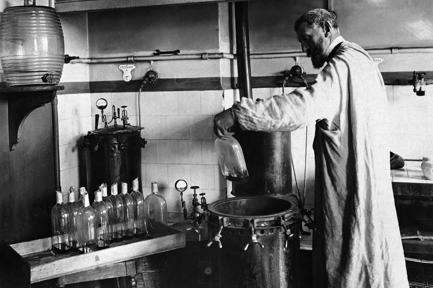 Louis Pasteur performing an experiment.