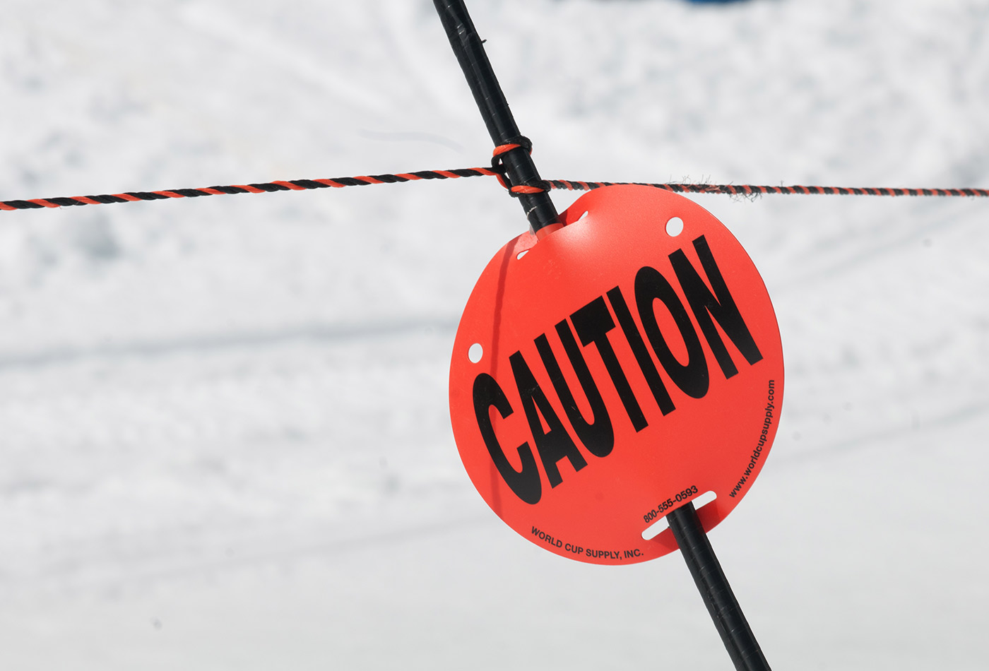 Caution sign on ski slope