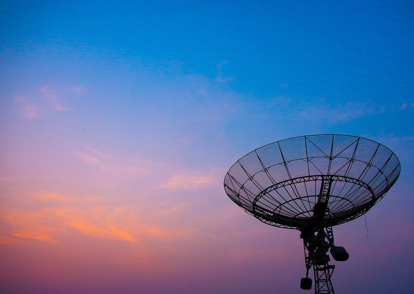 Radar dish at dusk